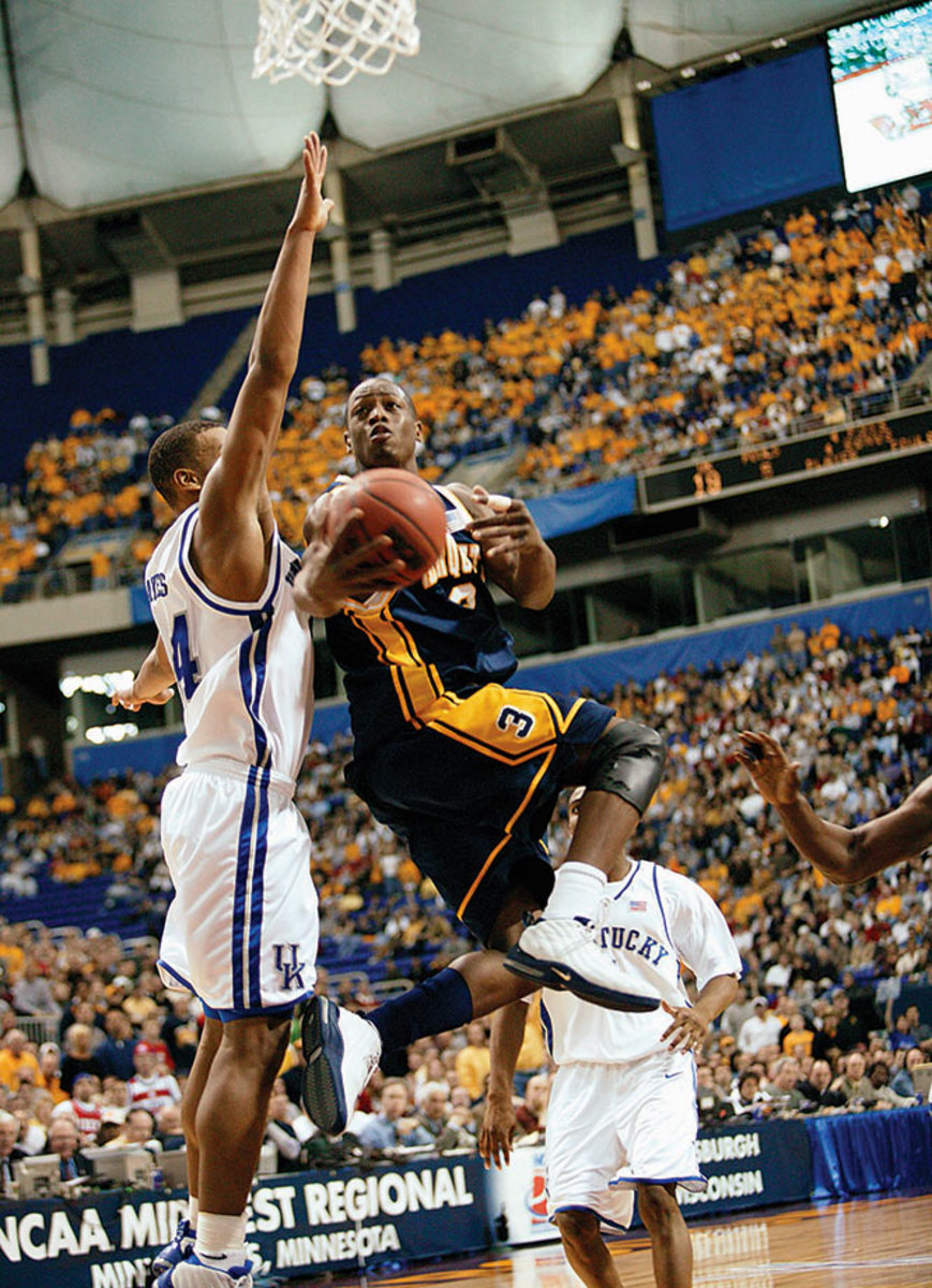 2003-0329-Dwyane-Wade-Chuck-Hayes-001357308.jpg